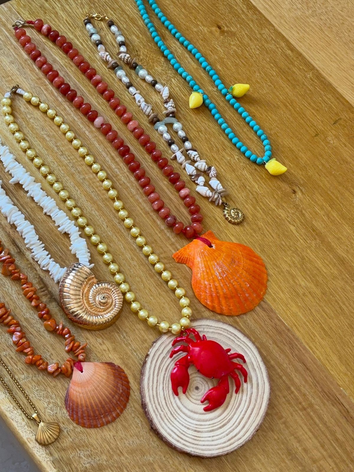 Colorful handmade jewelry materials and finished pieces by Casa Mari